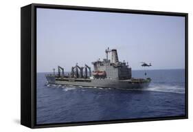 An Mh-60S Sea Hawk Conducts a Vertical Replenishment with USNS Laramie-null-Framed Stretched Canvas