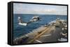 An Mh-60S Sea Hawk Helicopter Delivers Supplies to USS Bonhomme Richard-null-Framed Stretched Canvas