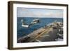 An Mh-60S Sea Hawk Helicopter Delivers Supplies to USS Bonhomme Richard-null-Framed Photographic Print