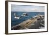 An Mh-60S Sea Hawk Helicopter Delivers Supplies to USS Bonhomme Richard-null-Framed Photographic Print