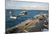 An Mh-60S Sea Hawk Helicopter Delivers Supplies to USS Bonhomme Richard-null-Mounted Photographic Print