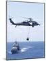 An Mh-60S Sea Hawk Helicopter Flying in Front of USS Gettysburg-null-Mounted Premium Photographic Print