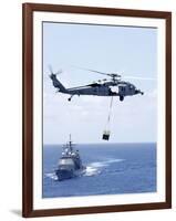 An Mh-60S Sea Hawk Helicopter Flying in Front of USS Gettysburg-null-Framed Photographic Print