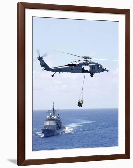 An Mh-60S Sea Hawk Helicopter Flying in Front of USS Gettysburg-null-Framed Photographic Print