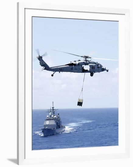 An Mh-60S Sea Hawk Helicopter Flying in Front of USS Gettysburg-null-Framed Photographic Print