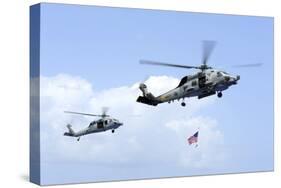 An Mh-60S Sea Hawk Helicopter Follows Behind an Mh-60R Sea Hawk-null-Stretched Canvas