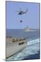 An Mh-60S Sea Hawk Helicopter Transfers Supplies During a Replenishment at Sea-null-Mounted Photographic Print