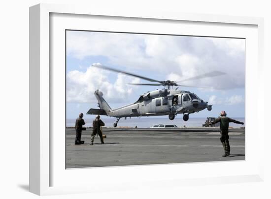 An Mh-60S Sea Hawk Lands on the Flight Deck of USS John C. Stennis-null-Framed Photographic Print