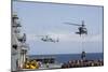 An Mh-60S Sea Hawk Picks Up Cargo from USNS Medgar Evers-null-Mounted Photographic Print