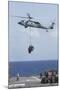 An Mh-60S Sea Hawk Picks Up Cargo from USNS Medgar Evers-null-Mounted Photographic Print