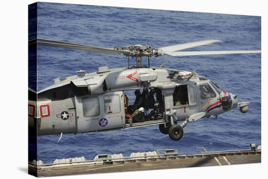 An Mh-60S Sea Hawk Prepares to Land on the Flight Deck of USS Nimitz-null-Stretched Canvas