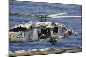 An Mh-60S Sea Hawk Prepares to Land on the Flight Deck of USS Nimitz-null-Mounted Photographic Print