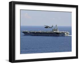 An MH-60S Seahawk Helicopter Flies over USS George H.W. Bush-Stocktrek Images-Framed Photographic Print