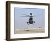 An Oh-58D Kiowa Warrior Hovers over the Flight Line at Camp Speicher, Iraq-null-Framed Photographic Print