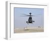 An Oh-58D Kiowa Warrior Hovers over the Flight Line at Camp Speicher, Iraq-null-Framed Photographic Print