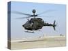 An Oh-58D Kiowa Warrior Hovers over the Flight Line at Camp Speicher, Iraq-null-Stretched Canvas
