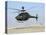 An Oh-58D Kiowa Warrior Hovers over the Flight Line at Camp Speicher, Iraq-null-Stretched Canvas