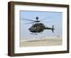An Oh-58D Kiowa Warrior Hovers over the Flight Line at Camp Speicher, Iraq-null-Framed Photographic Print