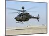 An Oh-58D Kiowa Warrior Hovers over the Flight Line at Camp Speicher, Iraq-null-Mounted Photographic Print