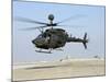 An Oh-58D Kiowa Warrior Hovers over the Flight Line at Camp Speicher, Iraq-null-Mounted Photographic Print