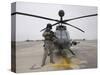 An Oh-58D Kiowa Warrior Pilot Stands Beside His Aircraft-null-Stretched Canvas