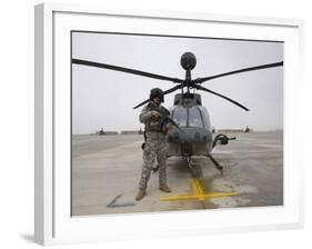 An Oh-58D Kiowa Warrior Pilot Stands Beside His Aircraft-null-Framed Photographic Print