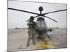 An Oh-58D Kiowa Warrior Pilot Stands Beside His Aircraft-null-Mounted Photographic Print