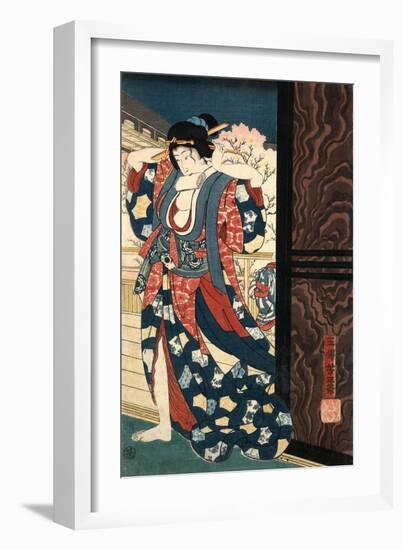 An Oiran with a Paper Kerchief in Her Mouth Advances Toward the Left-Yoshitoshi Taiso-Framed Art Print