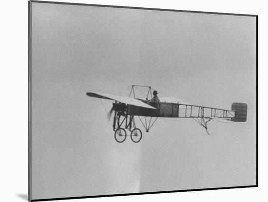 An Old Fashion Plane Flying at the Air Force's 50th Birthday Show-null-Mounted Photographic Print