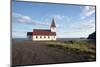 An old fashioned church overlooking Vik, in Iceland-Natalie Tepper-Mounted Photo