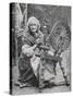 An Old Irishwoman at Her Spinning-Wheel-W^ Lawrence-Stretched Canvas