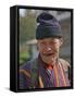 An Old Man at Trashigang Wearing the Traditional Gho Robe of All Bhutanese Men-Nigel Pavitt-Framed Stretched Canvas