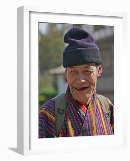 An Old Man at Trashigang Wearing the Traditional Gho Robe of All Bhutanese Men-Nigel Pavitt-Framed Photographic Print