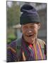 An Old Man at Trashigang Wearing the Traditional Gho Robe of All Bhutanese Men-Nigel Pavitt-Mounted Photographic Print