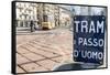 An old sign in Italian that says Trams go to Duomo, with a traditional Milanese tram in the backgro-Alexandre Rotenberg-Framed Stretched Canvas