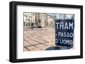 An old sign in Italian that says Trams go to Duomo, with a traditional Milanese tram in the backgro-Alexandre Rotenberg-Framed Photographic Print
