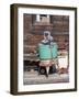 An old washing machine and old rusty stove on the porch of a building in ghost town.-Julie Eggers-Framed Photographic Print