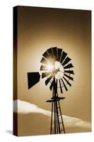 An Old Windmill Backlit In The Early Morning Light Along Highway 25 In San Benito County-Ron Koeberer-Stretched Canvas