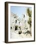 An Old Woman Sits in Front of Her Demolished Home in Castelforte-null-Framed Photographic Print