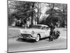 An Oldsmobile at the Corner of an American Street, 1954-null-Mounted Photographic Print