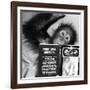 An Orangutan reading ghost stories-Staff-Framed Photographic Print