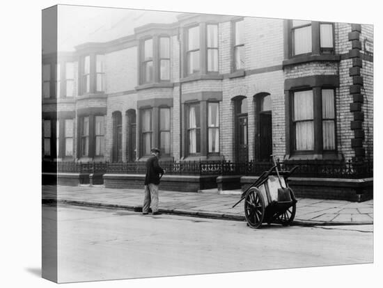 An 'Orderly Boy' and His Cart Sweeping a Street, Liverpool, 1935-null-Stretched Canvas