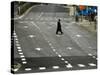 An Orthodox Israeli Jew Walks Across an Empty Road During the Sabbath-null-Stretched Canvas
