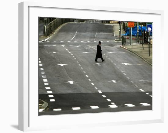 An Orthodox Israeli Jew Walks Across an Empty Road During the Sabbath-null-Framed Photographic Print