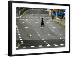 An Orthodox Israeli Jew Walks Across an Empty Road During the Sabbath-null-Framed Photographic Print