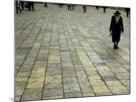 An Orthodox Israeli Jew Walks Across the Plaza Next to the Western Wall-null-Mounted Photographic Print