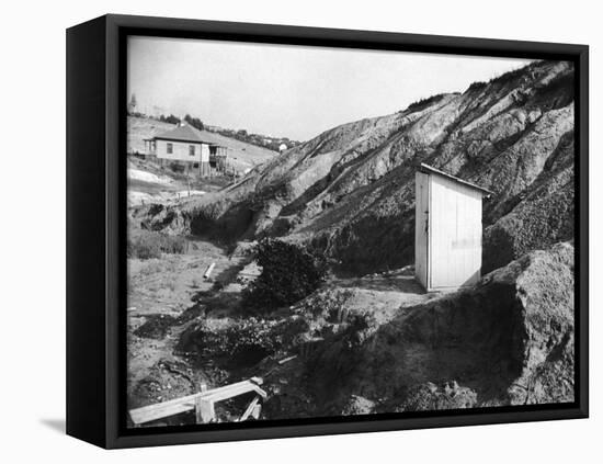 An Outhouse in an Area That Is Plagued with Soil Erosion-Alfred Eisenstaedt-Framed Stretched Canvas