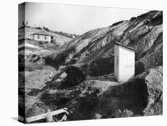 An Outhouse in an Area That Is Plagued with Soil Erosion-Alfred Eisenstaedt-Stretched Canvas