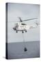 An SA-330 Puma Transport Helicopter Moves Cargo During a Vertical Replenishment-null-Stretched Canvas