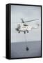 An SA-330 Puma Transport Helicopter Moves Cargo During a Vertical Replenishment-null-Framed Stretched Canvas